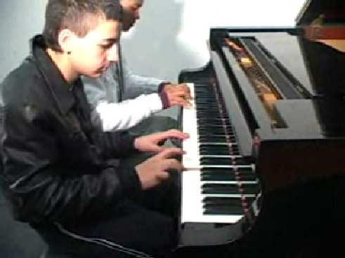 music as a sport neurodidactic brain-based method migrant boys playing piano
